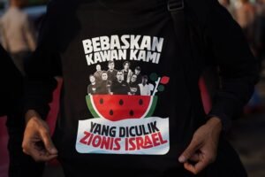 Aksi peduli pembebasan 9 Delegasi Kemanusiaan Global Peace Convoy Indonesia.